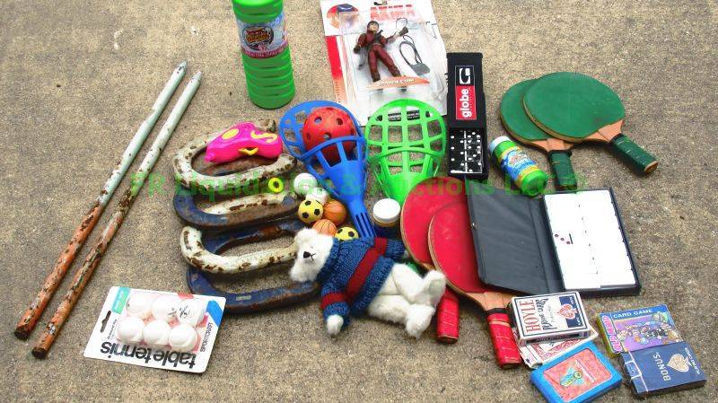 lot 57 image: Assorted game equipment and gear as shown