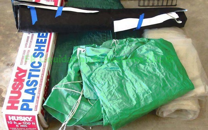 lot 82 image: Husky plastic sheeting roll and plastic tarps plus