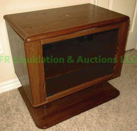 lot 118 image: Laminated TV stand with carousel top