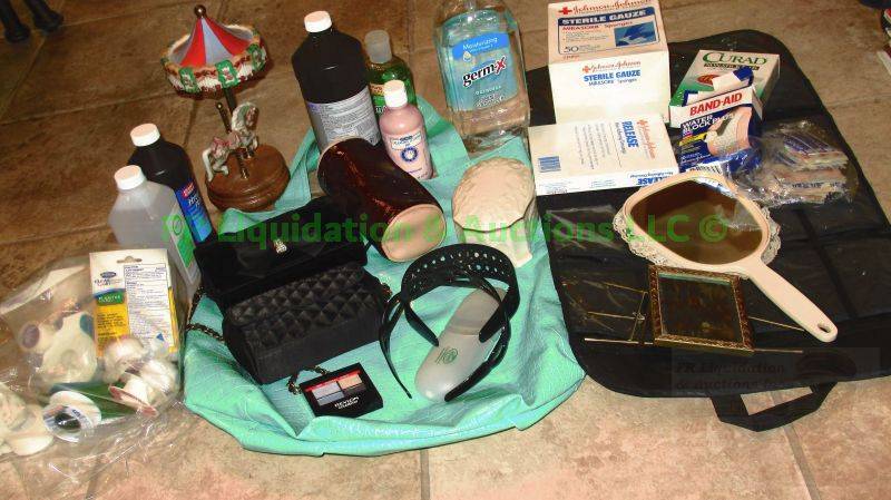 lot 184 image: Assorted first aid supplies, music boxes and more