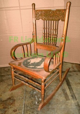 lot 35 image: Antique solid oak rocking chair, leather seat pad is worn and flaking