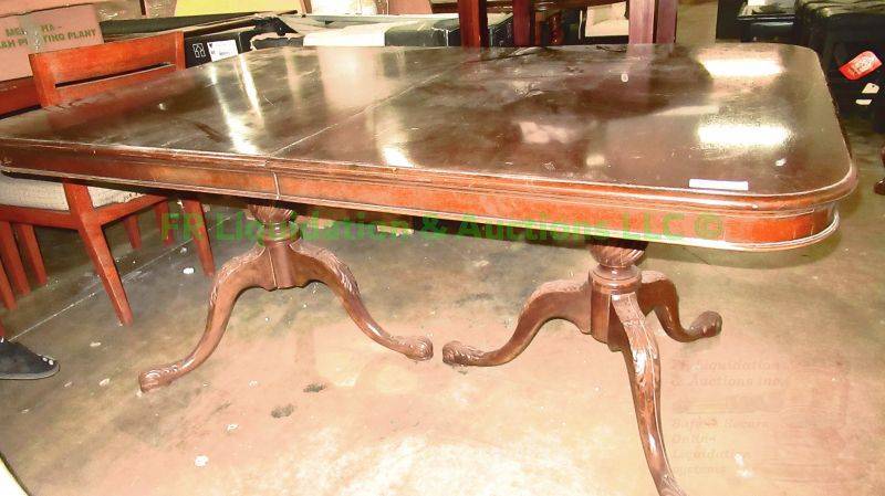 lot 103 image: Vintage double pedestal triple foot base dining table, 66 long 44 wide