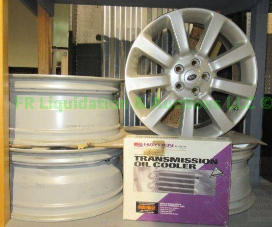 lot 376 image: Land Rover Cromodora wheel rims (4 total) plus Hatden Transmission oil cooler