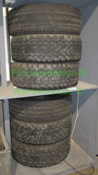 lot 378 image: BF Goodrich and others tires approx. 25%-35% tread 6 total