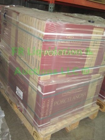 lot 527 image: Porcelanosa Itilian floor tiles 17 x 26 x 12 approx. Pallet full unopened boxes