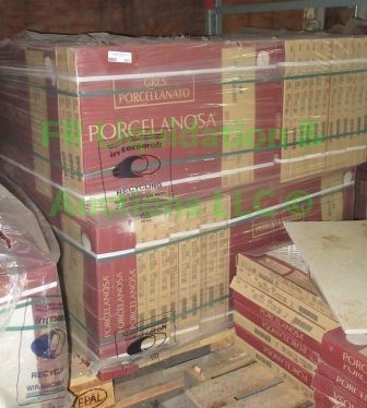 lot 531 image: Porcelanosa Itilian floor tiles 17 x 26 x 12 approx. Pallet full unopened boxes