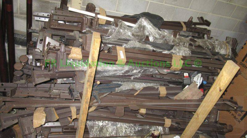 lot 571 image: Assorted metal bed rails as shown, generous quantity