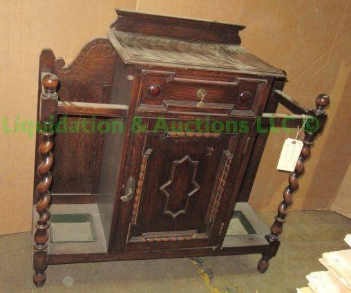 lot 628 image: Antique entry hall console with umbrella holds, 39 x 35 x 12