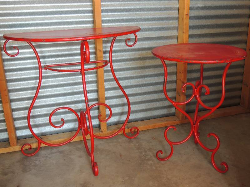 lot 697 image: Two red metal tables -- 12 round table 30  14 tall 30  34 wide  15  34 deep  Round table   26 tall 19  12 diameter