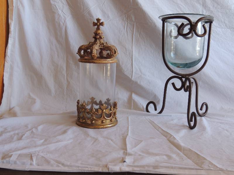 lot 729 image: Metal stand with glass candle holder 14  12 tall 9 deep 7 diameter. Decorative candle  holder with gold crosses on side and lid  14  12 tall