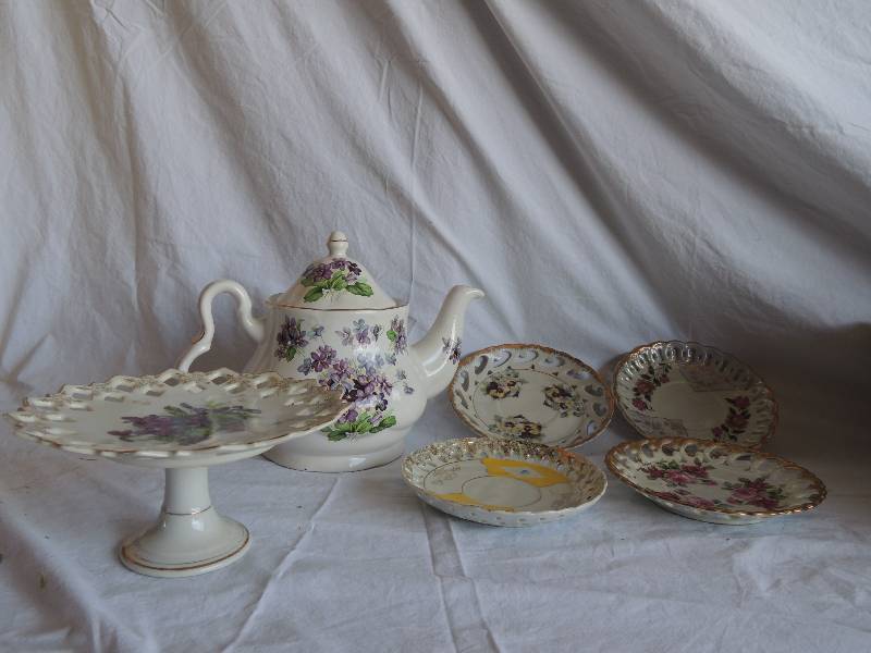 lot 757 image: Golden Crown (ENGLAND) Bone China TEA POT,   LACE CUT PEDISTAL PLATE - PURPLE FLOWERS  4 DECORATIVE PLATES W attractive designs