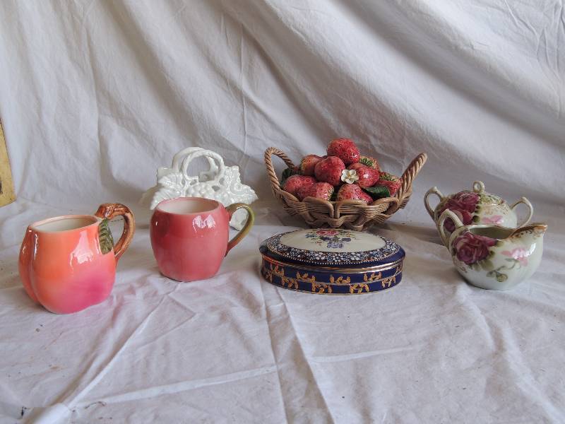 lot 759 image: Nippon Sugar and creamer - PINK ROSES 2 Apple coffee mugs,   ASEVRES PORCELAIN  Royal Blue trinket box, CERAMIC BASKET  WITH Strawberries and WHITE Napkin holder