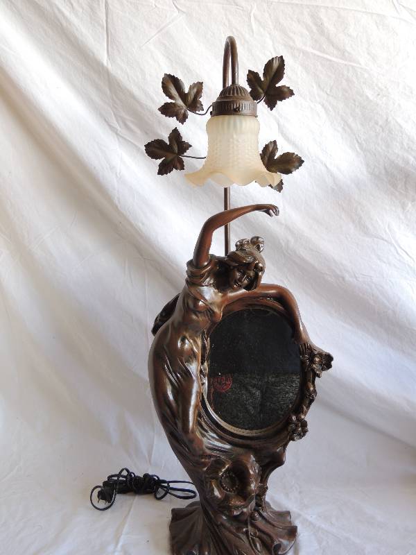 lot 769 image: Dark brown lady light with mirror 30.5 tall unknown working status