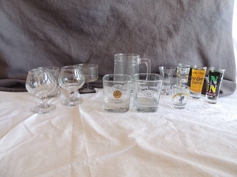 lot 777 image: 5 single shot glasses 2 jack Daniels glasses 2 Diamore wine glasses and more