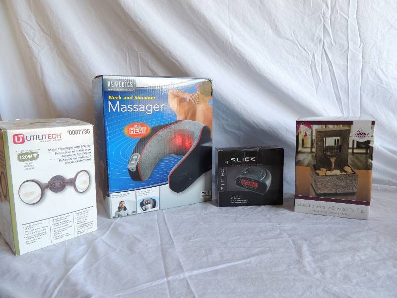 lot 784 image: Weeping walls LED water fountain (NIB)    Slick alarm clock (NIB)     neck and shoulder massager (NIB)     Utilitech 120 w Light NIB