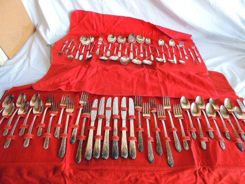 lot 788 image: Set  of stainless steel silverware Red cloth  - service for 6 ,and serving pieces - 60 pcs  stainless steel