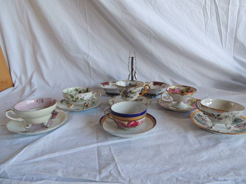 lot 791 image: 6 sets of coffee cups with matching saucers, sugar cube and lemon set with spoons and holder