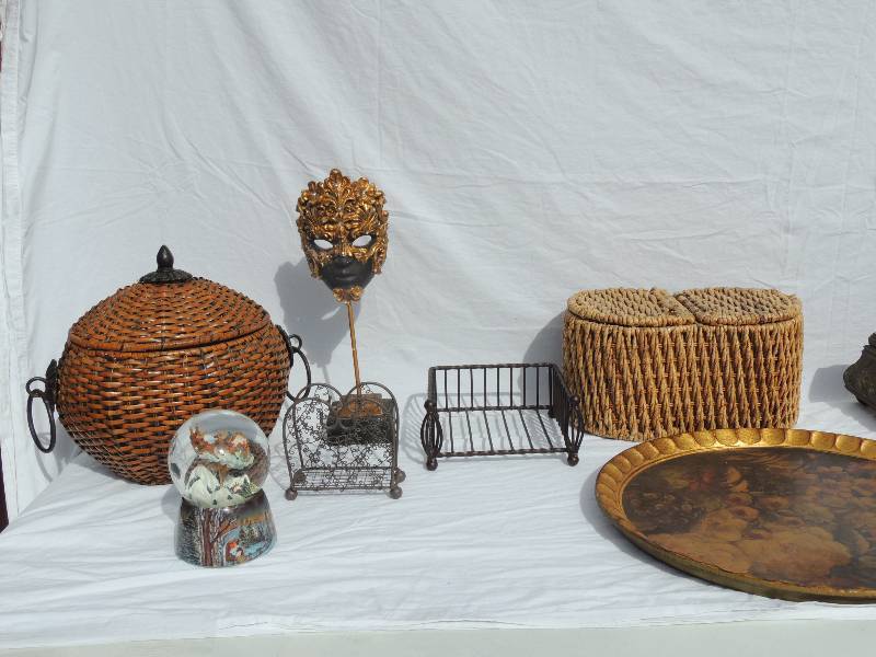 lot 804 image: Hand painted decorative fruit plate, Santa snow globe, metal napkin holder that stands and folds, 2 nice wicker baskets with tops, decorative wooden hand carved jewelry box