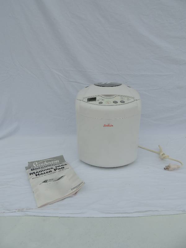 lot 809 image: New Sunbeam bread maker with owners manual and recipes