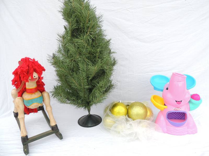 lot 821 image: Playschool Dumbo the elephant game (missing balls) mini d decorative wooden rocking horse, yellow-green Christmas bulbs and small green Christmas tree