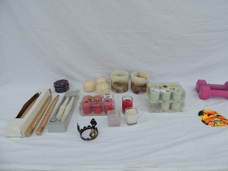 lot 822 image: Lots of  candles,   5lb. Hand weights and dolphin sand dollar