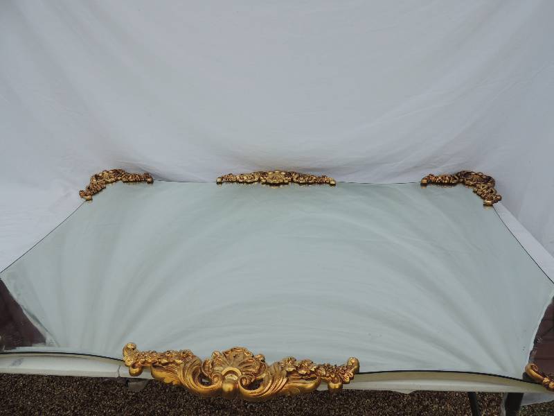 lot 835 image: LARGE WALL MIRROR - GOLD DCOR AT ACROSS THE TOP & BASE  34h X 52 L