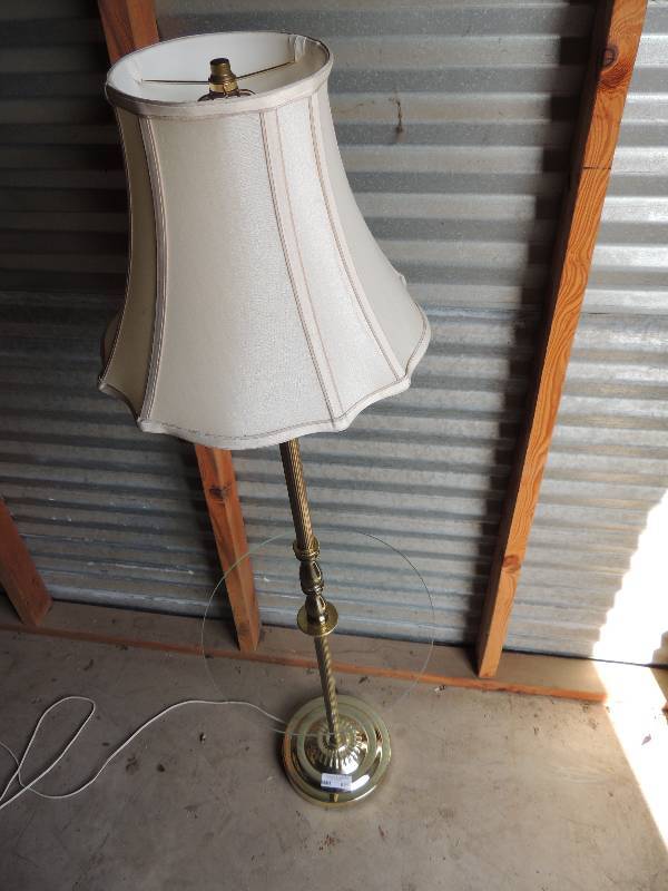 lot 744 image: Brass floor lamp with glass shelf
