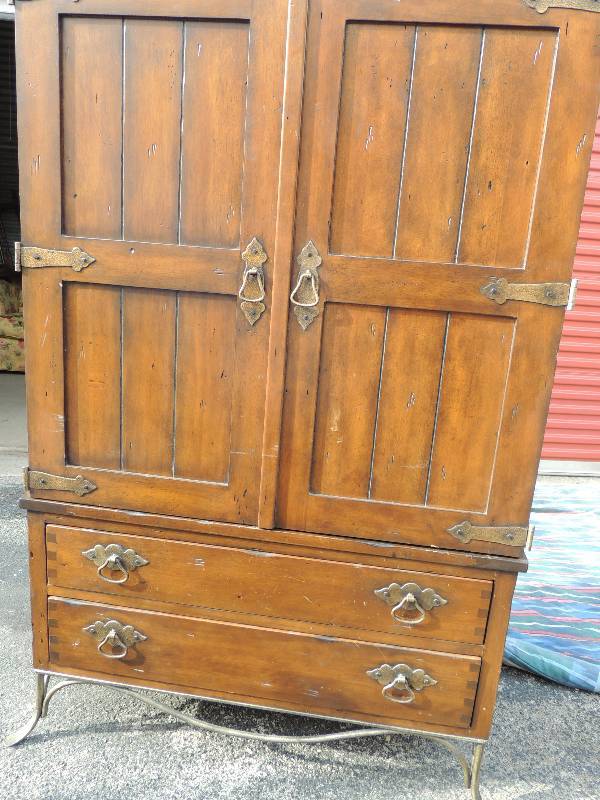 lot 853 image: Two piece dark brown  metal bottom hutch. 1 wooden shelf on top . Bottom piece has 2 drawers 68 Tall 22 deep 39.5 length