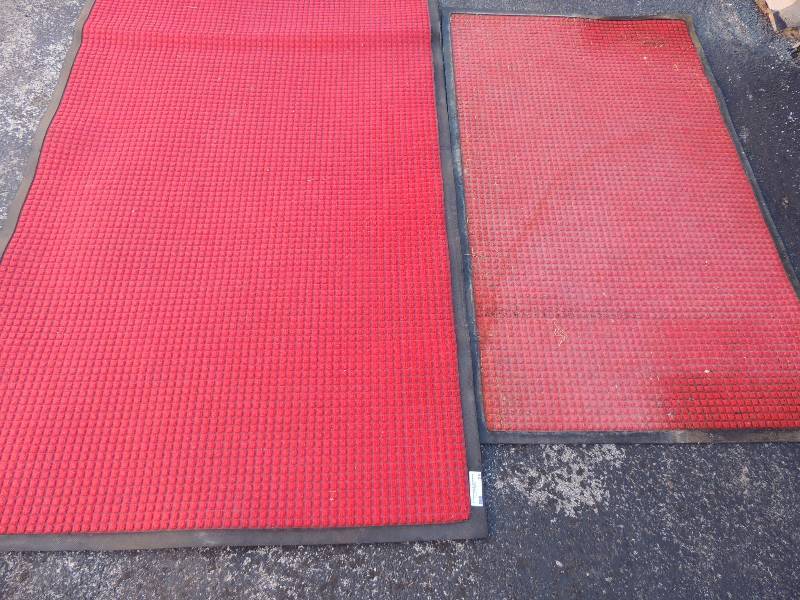 lot 875 image: 3 red Waterhog Carpet Mat -  rubber mats that are water absorbent two measure 67 x 45 one measures 58 x 34