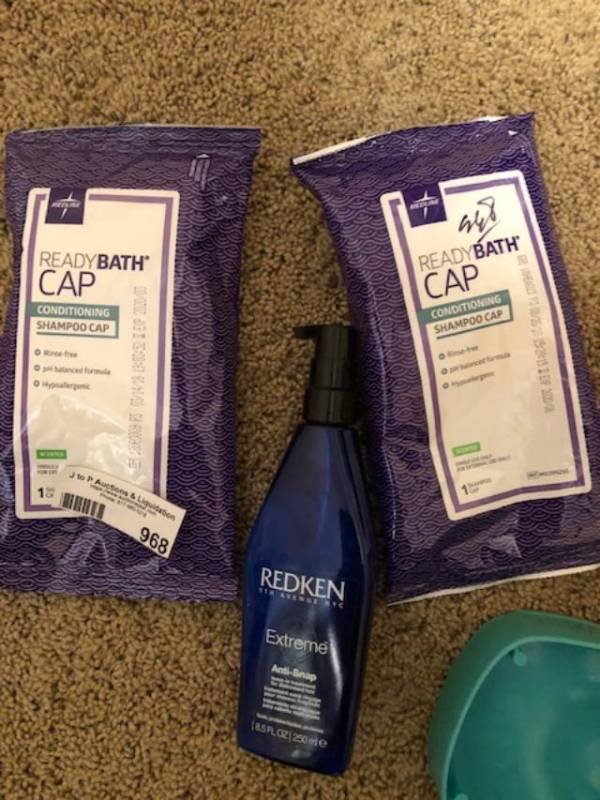 lot 968 image: SHOWER CAP SHAMPOO IN A  BAG, HAIR CARE  ITEMS
