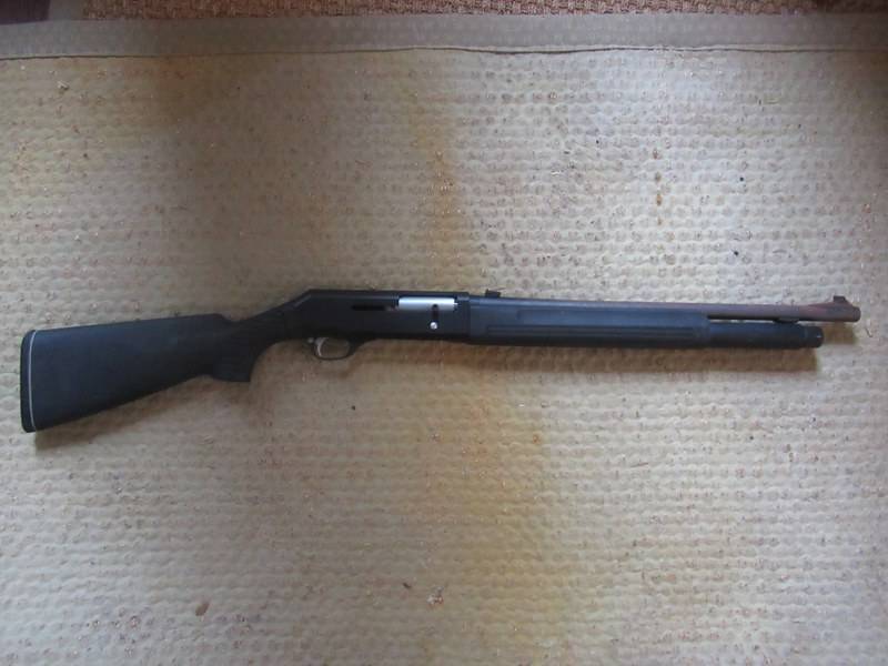 lot 7 image: BERETTA MODEL# 1201 FP-12 12 GAUGE SHOTGUN MADE IN ITALY
