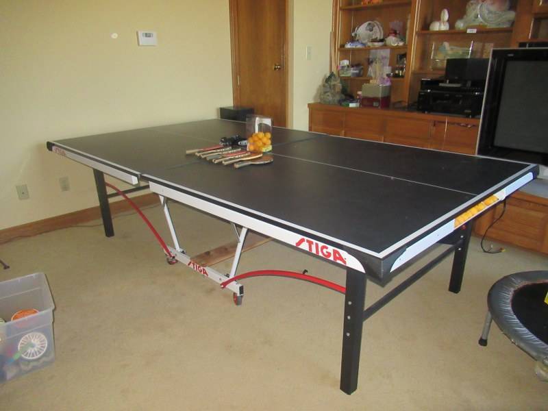 lot 46 image: STIGA MASTER SERIES TABLE TENNIS TABLE INCLUDES PADDLES, BALLS AND NET PLAYED ON ONCE