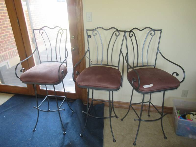 lot 55 image: BAR STOOLS METAL FRAMES THAT SWIVEL WITH GENUINE LEATHER SEATS IN SADDLE BROWN