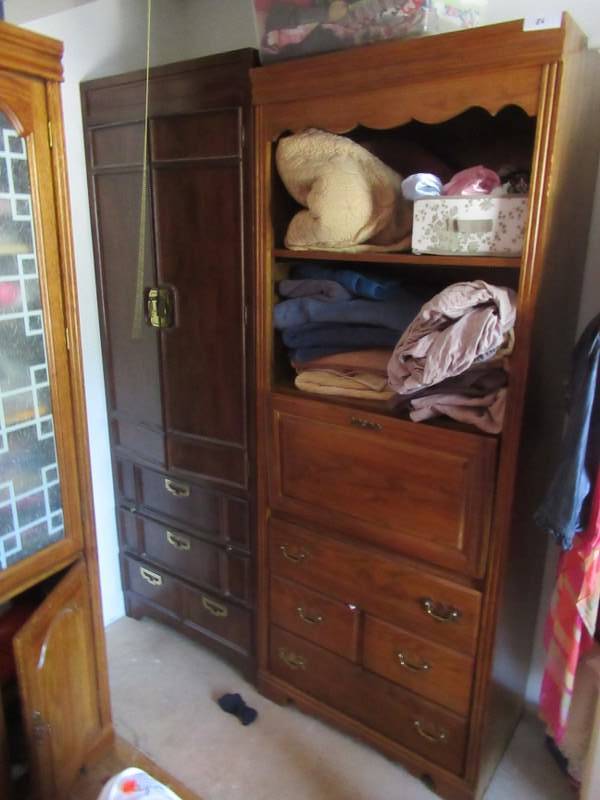 lot 86 image: 2 SOLID WOOD CLOTHS CABINETS 1 MEASURES 30 X 18 X 76 THE OTHER IS 28 X 18 X 78 BOTH DO NOT INCLUDE CONTENTS AND ARE VERY NICE