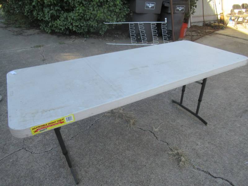 lot 151 image: LIFETIME ADJUSTABLE HEIGHT TABLE