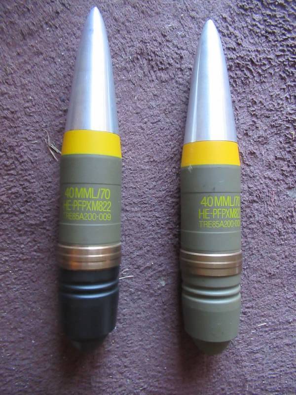 lot 163 image: 2 SHELLS MARKED 40MML70