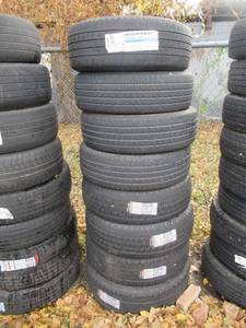 lot 14 image: SUMITOMO AND MILESTAR TIRES 24565R17 AND LT24575R17 USED TIRES GOOD TREAD SOME WORN