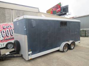 lot 28 image: WELLS CARGO ENCLOSED TRAILER TANDEM AXLE 18 X 8.5 HAS SOME DAMAGE ON EXTERIOR AS SHOWN. BILL OF SALE ONLY NO TITLE.