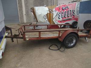 lot 29 image: SINGLE AXLE METAL TRAILER WITH WOOD FLOOR 10FT. X 5FT. WHEEL WELL DENTED. NO TITLE BILL OF SALE ONLY