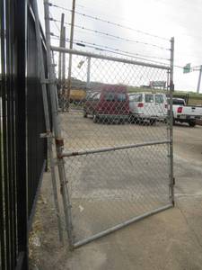 lot 38 image: 2 GALVANIZED FENCE GATES WITH RAZOR WIRE ON TOP 94 X 68