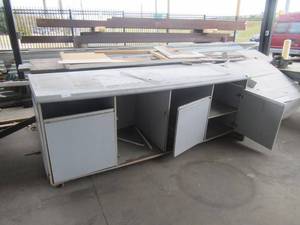 lot 39 image: WOOD AND LAMINATE CABINET 95 X 32 X 32 AND LARGE ASSORTMENT OF WOOD