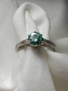 lot 21 image: 1 Ct Green Diamond Sterling Ring