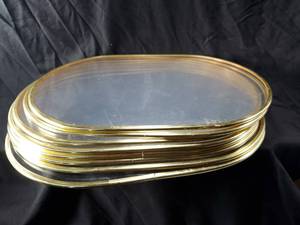 lot 31 image: Mid Century Acrylic Placemats with Metal Rim