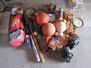 lot 72 image: SPORTING GOOD LOT INCLUDES 9 BASEBALL GLOVES (RAWLINGS,WILSON,SPALDING,MAG,FRANKLIN), BASEBALLS, BASKETBALLS, BATS, RACKETBALL RACKETS, COWBOYS FRESBEE AND MORE