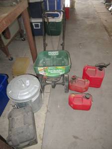 lot 79 image: SCOTTS TURF BUILDER SPREADER, 3 GAS CANS, TIN TRASH CAN AND PLASTIC BATTERY BOX