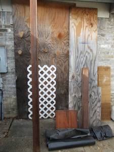 lot 86 image: BUILING MATERIALS INCLUDING ANGLE IRON, PLY WOOD, BLACK PLASTIC ROLLS AND MORE