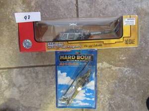lot 98 image: DALLAS COWBOYS BELL JET RANGER 143 SCALE DIE CAST COLLECTIBLE NEVER REMOVED FROM BOX AND TOOTSIETOY APACHE AG-64A DIE CAST HELICOPTER