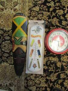 lot 105 image: COCA-COLA CLOCK, WINCHESTER THERMOMETER AND JAMAICAN HAND CARVED MASK