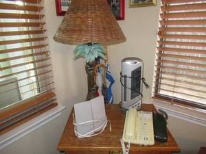 lot 117 image: UNIQUE MONKEY LAMP VERY HEAVY, HAIER DESKTOP FAN WITH IONIZER, PHONES AND A PAIR OF COMPUTER SPEAKERS