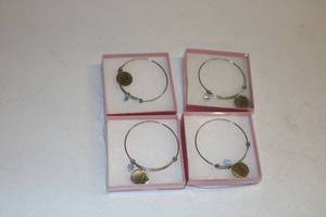 lot 79 image: Cute Bracelets with Letters on each bracelet A B D T - Lot of 4
